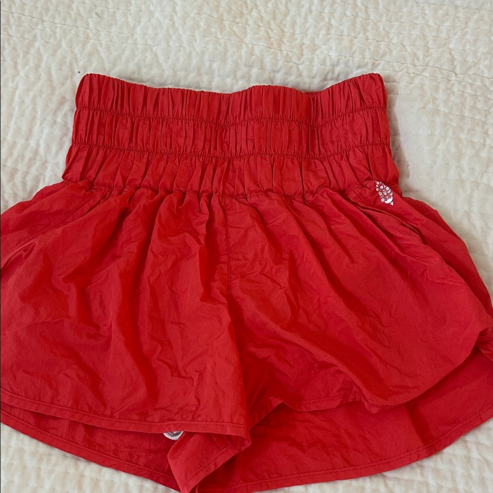Free people movement athletic height waist red/orange shorts